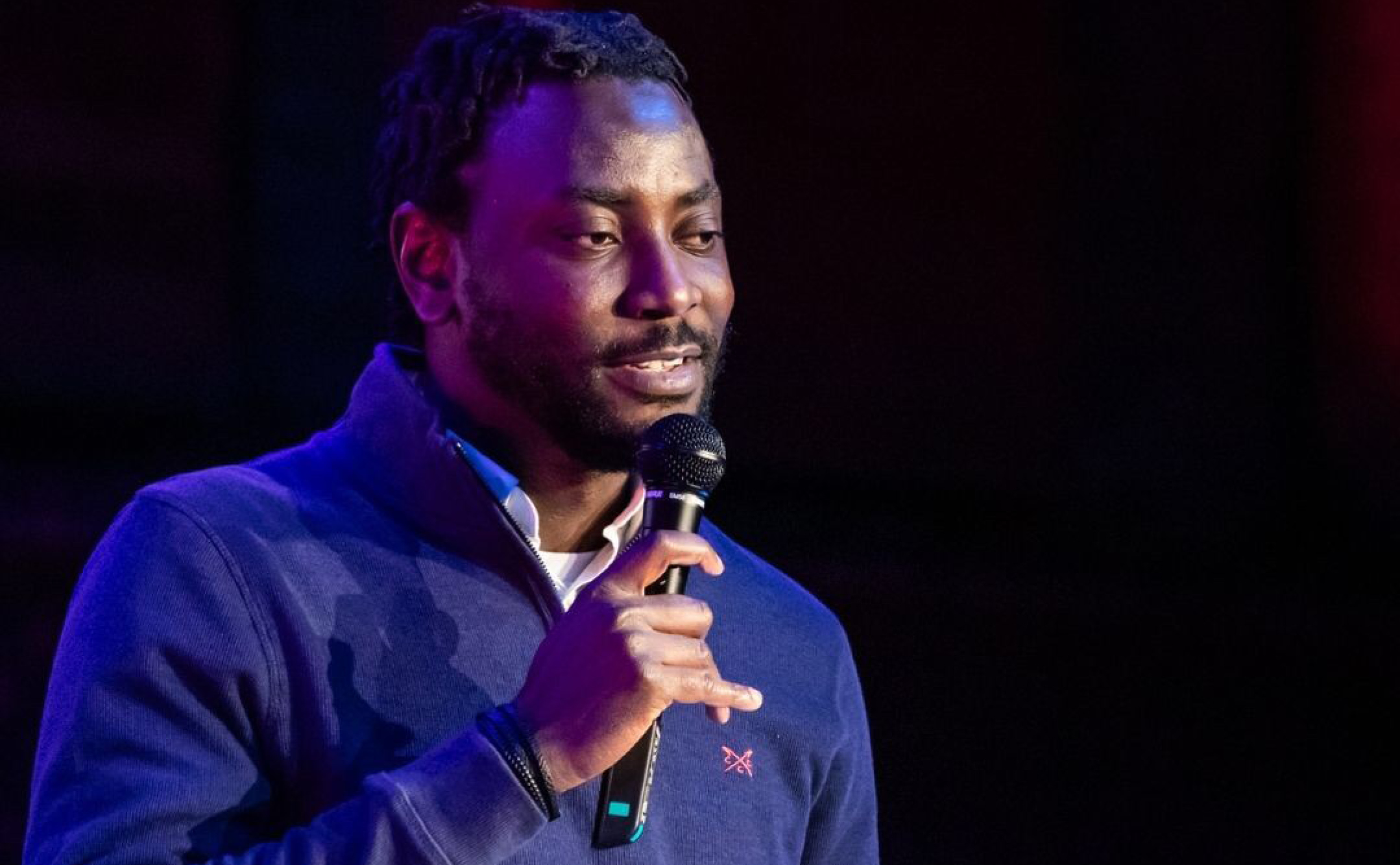 Akinwale delivering a marketing speech at Be United Creative Partnerships Conference 2026